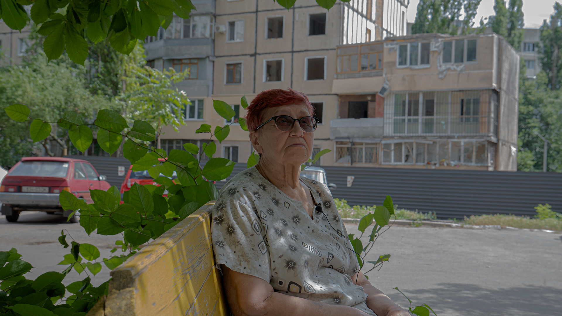 elderly woman on a bench